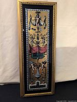 Full view of framed neoclassical artwork showing gilded frame and entire composition