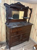 full view of sideboard with mirror and shelves
