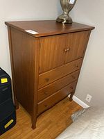 Front view of dresser showing doors and drawers