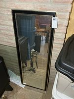 Full view of mirror showing frame and glass