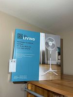 Front of sealed For Living pedestal fan box