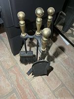 Full view of tool set and stand on brick floor