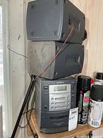 Front view of Sony stereo main unit with two stacked speakers