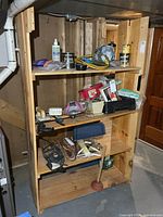 Full view of solid wood shelf unit with multiple shelves