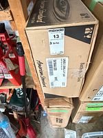 Outer carton showing American Standard branding and maxsold label indicating 2 sinks