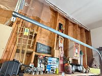 Shelf with bamboo trellis, solar globes, boxed spotlight, Off! box, edging panels