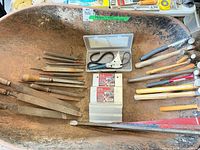 Overview of entire assortment in wheelbarrow