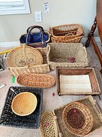 Group shot showing all ten baskets laid out on floor