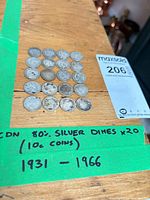 All 20 silver dimes laid out with label showing metal content and date range