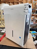 Front view of Danby dehumidifier showing brand marking and water-level window