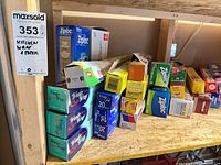 Shelf with multiple boxed wraps and bags showing variety