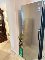 Front view of LG stainless upright freezer closed