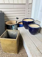 Group shot showing all planters and solar stake