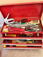 Open Craftsman toolbox with contents and drawers visible