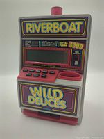 Front view showing graphics, screen, buttons and coin slot