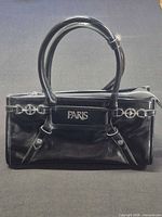 front view showing logo, handles, hardware