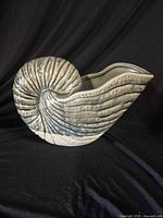 Right side view of ceramic nautilus shell planter