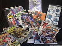All comics spread out showing fronts and protective bags