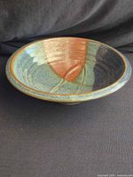 Oblique view of bowl showing glaze colors and shape