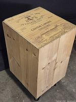 Full view of wooden crate side table with hairpin legs