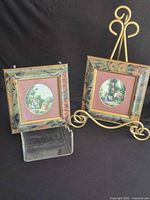 pair of framed prints front view