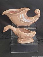 Front view of both planters showing overall forms and glaze