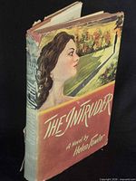 Dust jacket and spine view of The Intruder hardcover