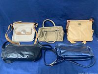 All five handbags arranged front view