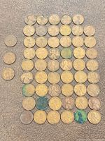 Grid showing majority of copper pennies; separate coins on left side