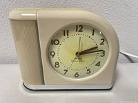 Front view of Westclox Big Ben Moon Beam electric alarm clock showing dial and case