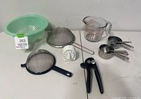 All kitchenware items laid out on table