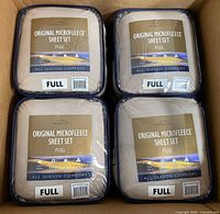 Four sealed sheet sets in box showing front labels