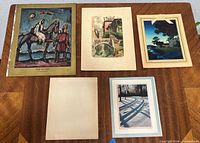 Five sheets on table showing all four art prints; Rouault upper left, Voit upper middle, Parrish upper right, Kabel lower right, plus one blank sheet