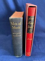 Spine view of both hardcover books and slipcase