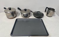 Group shot of all cookware items arranged on table