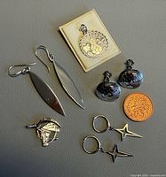 All five sterling silver items with scale coin