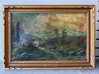Full view of framed oil landscape painting