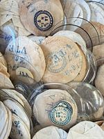 Close view showing multiple glass crystals and stamped paper envelopes