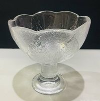 Full view of clear textured glass pedestal bowl