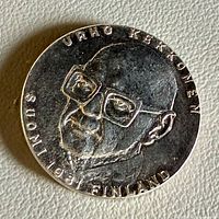 Obverse showing portrait, text and overall surface state