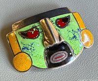 Front view showing enamel colors and mask design