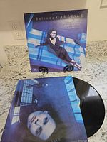 Front jacket, record, and inner sleeve visible