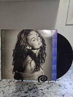 Front jacket showing Belinda Carlisle portrait and vinyl partially removed