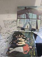 Front cover with inner sleeve and record partial