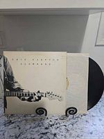 Front cover and record partially visible