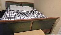Full bed assembled showing footboard and mattress