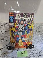 Front cover of Punisher 2099 #2 comic in protective sleeve