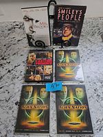 Front covers of all five DVD cases displayed