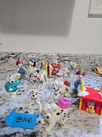 Group shot of assorted Dalmatian figurines on countertop