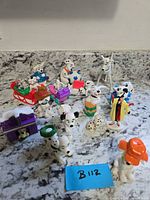 Group view of Dalmatian figurines and accessories